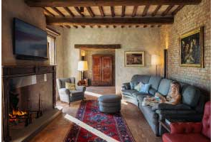 Original brick walls and lime plaster, patinated with dozens of layers of lime paint