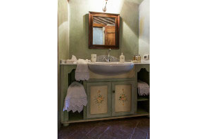 Hand painted cabinets and Busatti’s laces