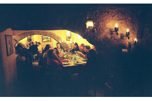 The hamlet <i>trattoria</i>, located at the base of the 14th century watch tower